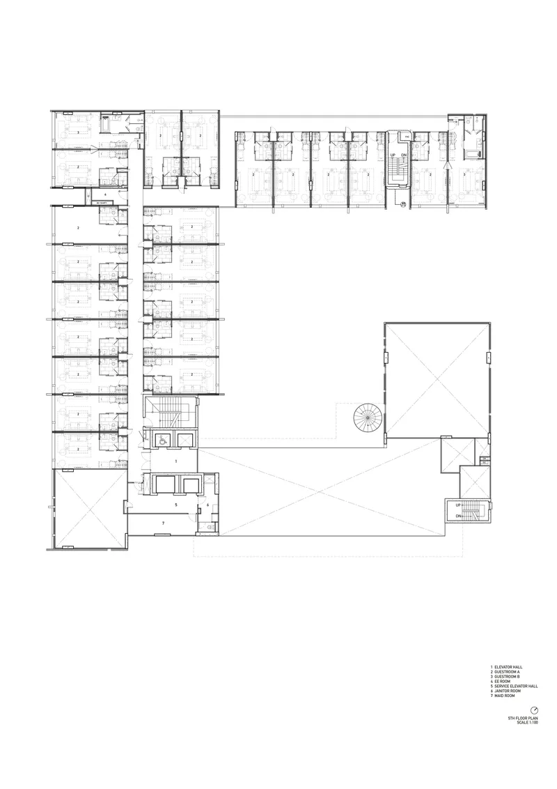 First floor plan drawing showing residential wings wrapping around large open courtyard space