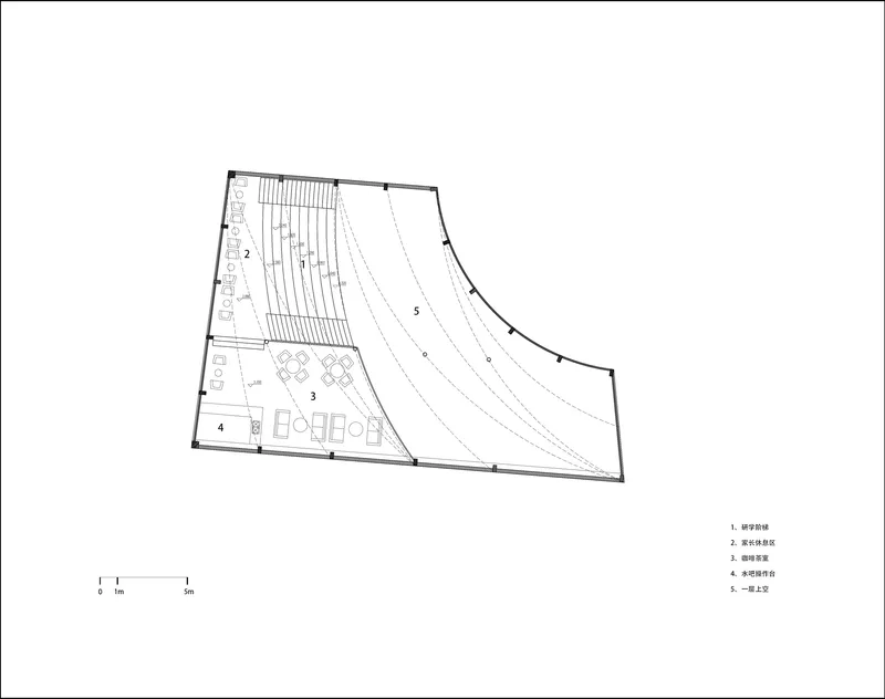 Floor plan drawing depicting assembly hall with sloped seating and support spaces including lounge and restrooms