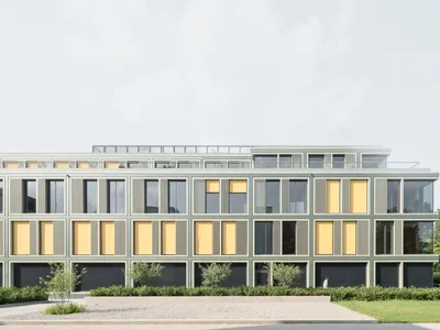 allmannwappner Strips a 1971 Munich Office Block Back to Its Bones and Gives It a Crisp Glass Skin