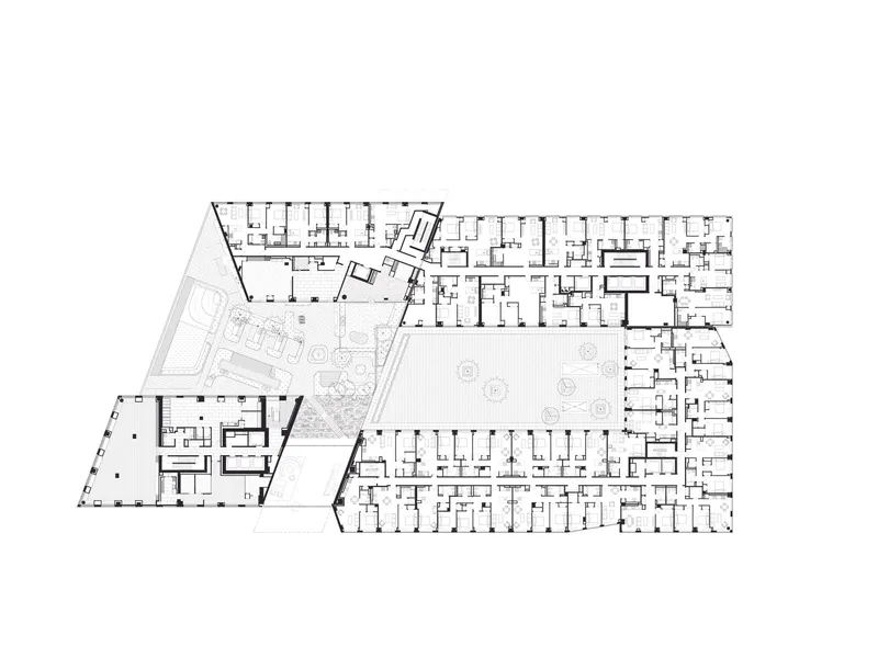 Floor plan showing residential units arranged around a central courtyard with landscaping