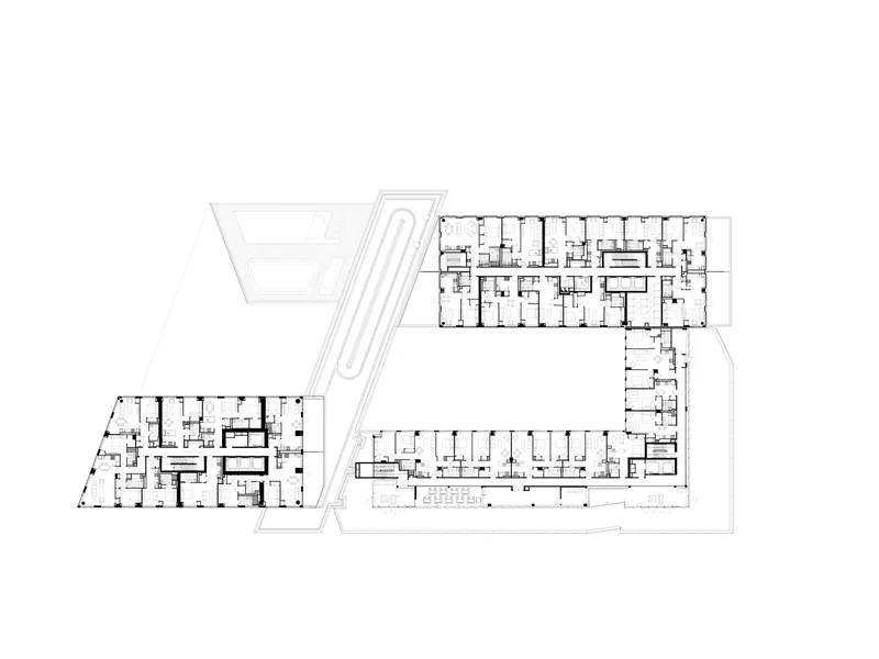 Floor plan showing ground level with residential units and a diagonal circulation element