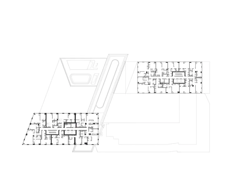 Floor plan showing upper level residential units separated by an open courtyard space
