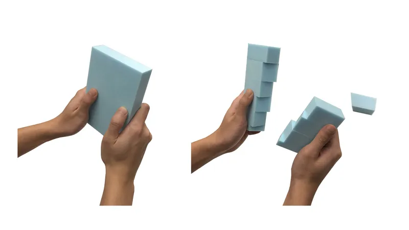 Hands holding three pale blue foam volume models demonstrating different massing configurations