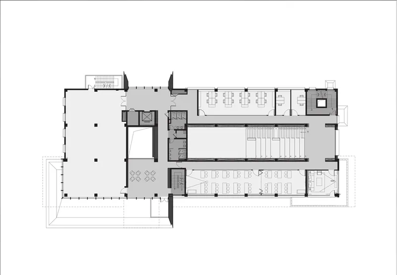 Floor plan drawing showing cellular offices and meeting rooms arranged around a central void