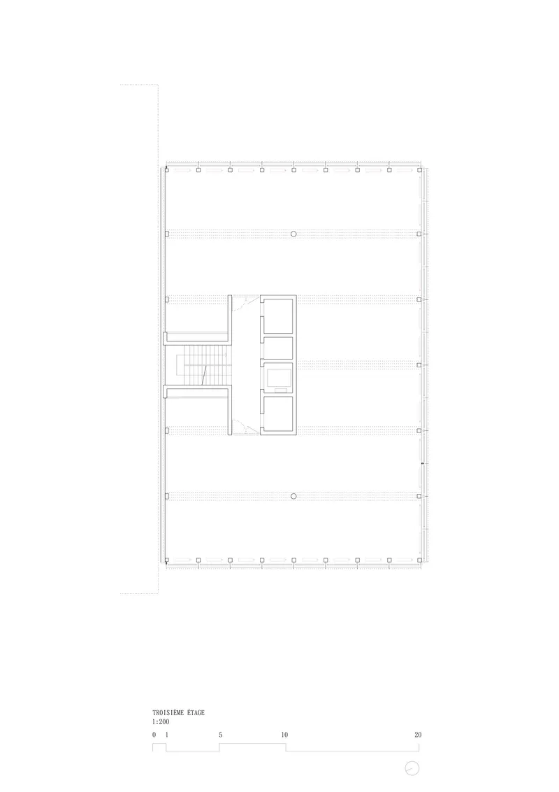 Floor plan drawing showing a central stair and elevator core with open space surrounding it