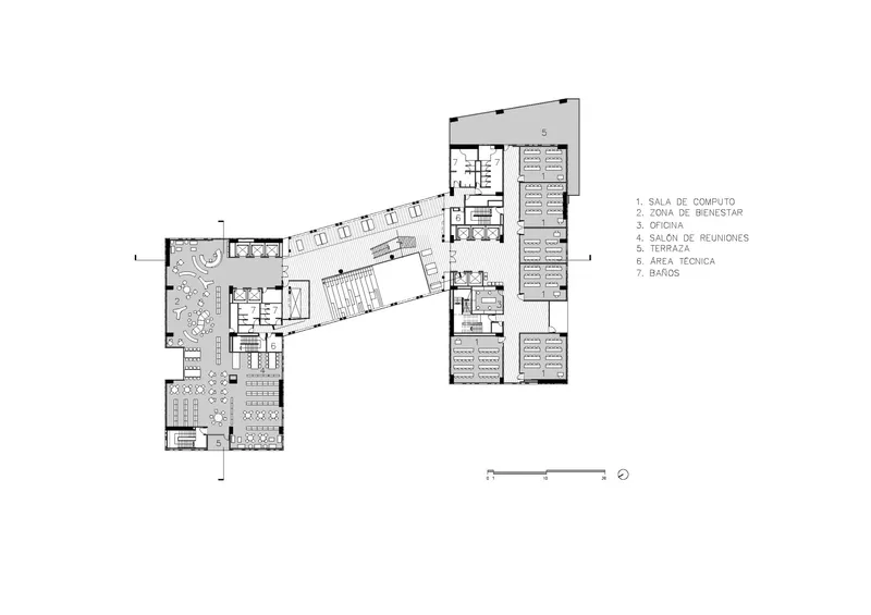 Floor plan drawing showing two rectangular wings connected by an angled central circulation spine
