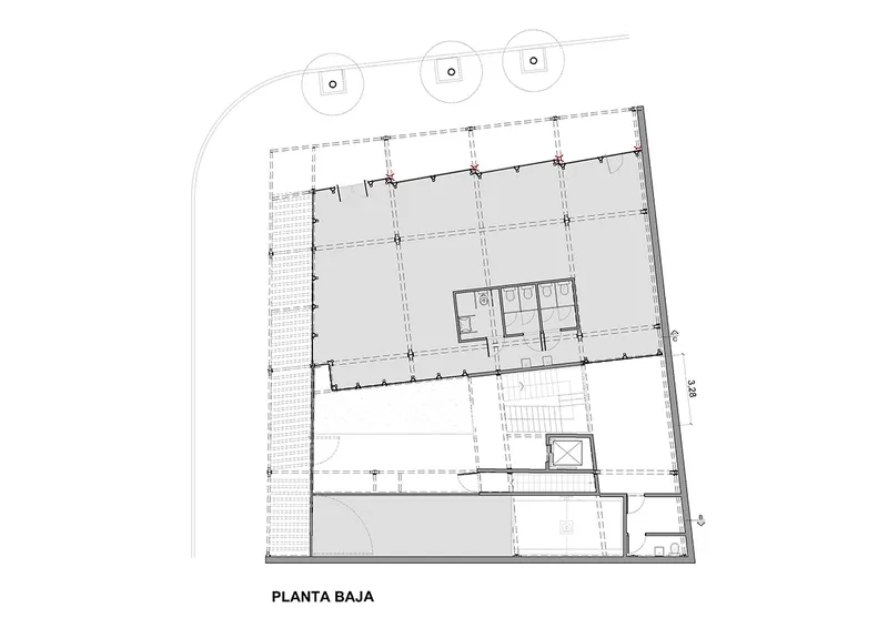 Ground floor plan drawing showing circulation areas and central service core with restrooms