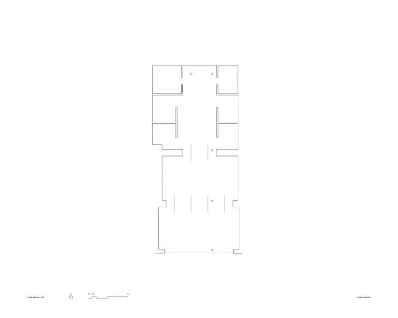 Floor plan drawing showing rectangular layout with rooms arranged around central circulation spaces