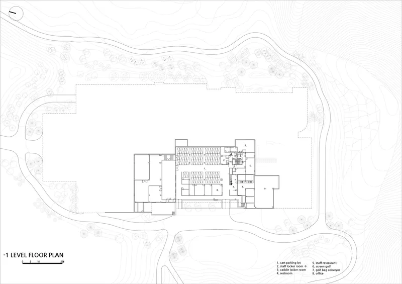 Level negative one floor plan drawing showing the building footprint nestled into sloping contours