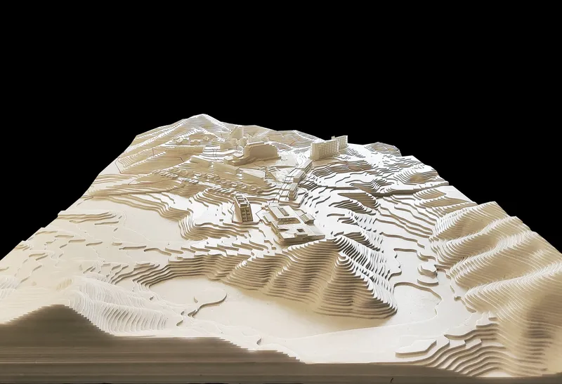 Closer view of the topographic model revealing clustered buildings nestled among contoured terrain