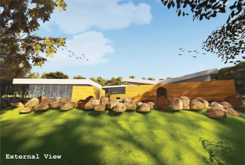Low-impact buildings blend into the woodland through natural materials and green roofs.