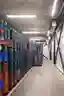 This image showcases the interior of a large cold storage warehouse, characterized by its concrete c