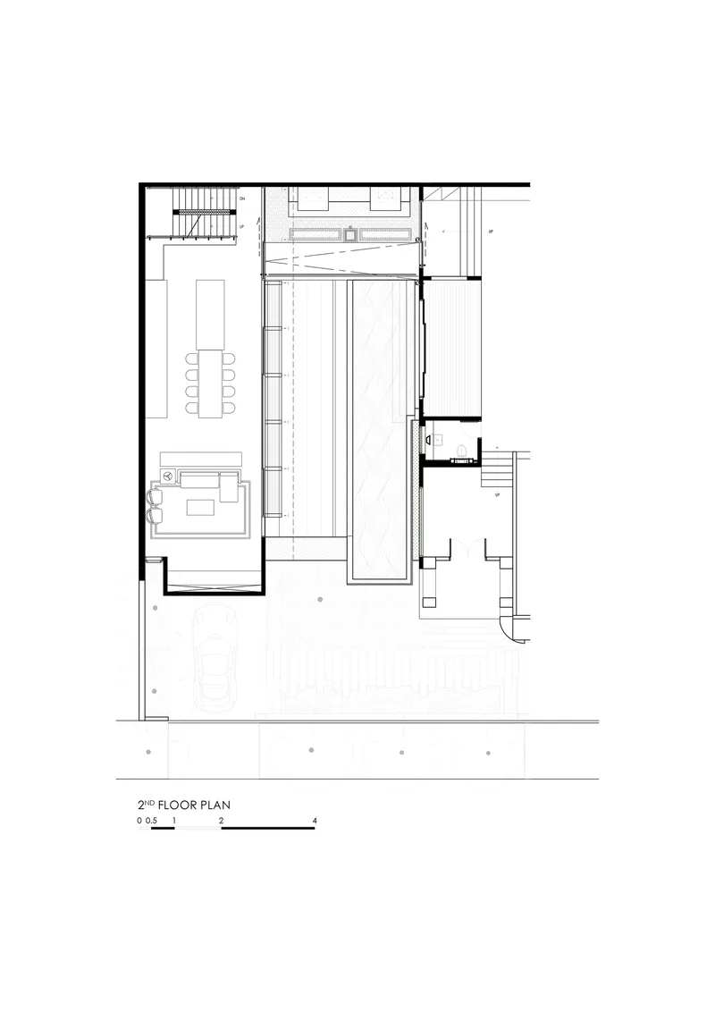 Second floor plan drawing showing living spaces and courtyard void