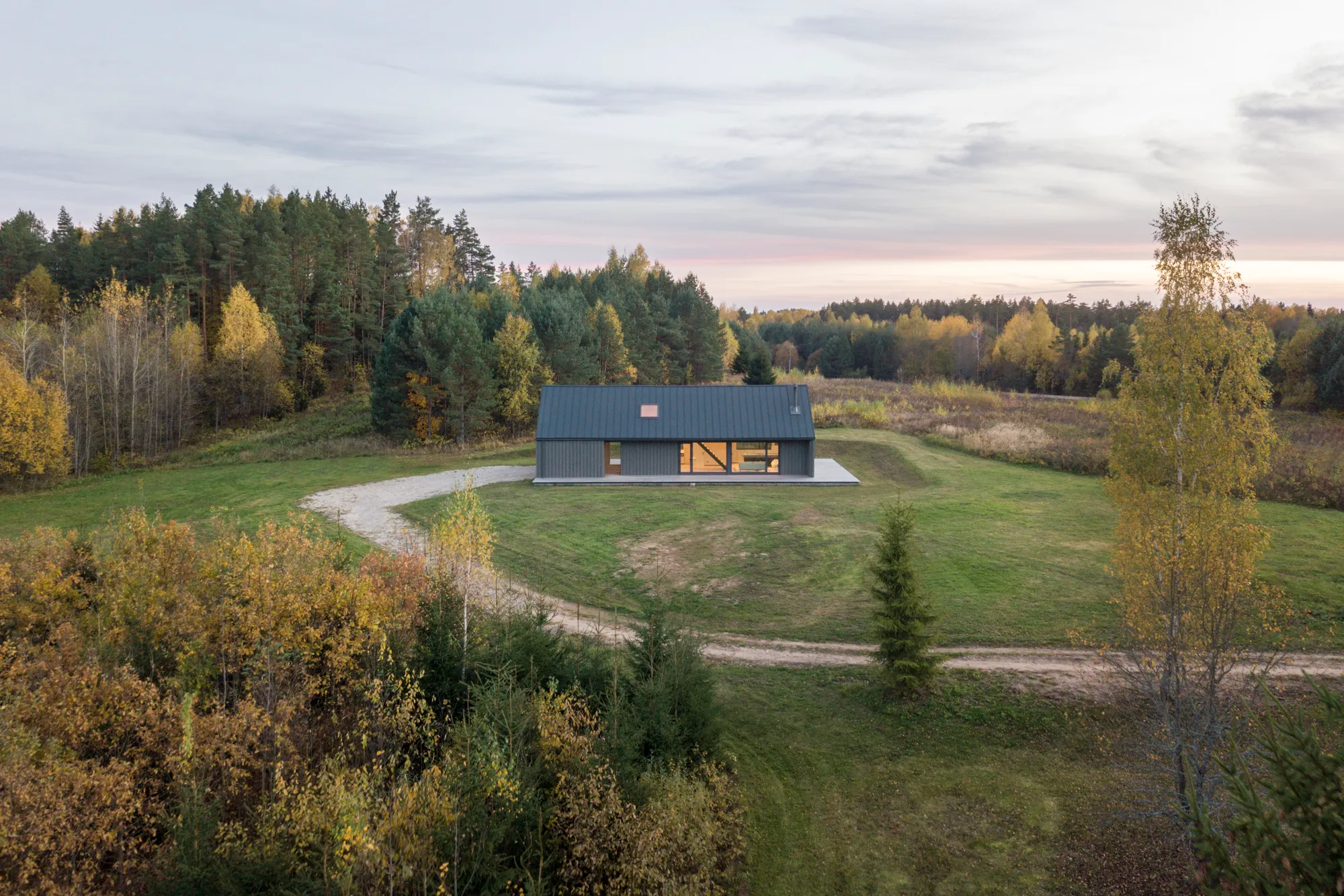 Devyni Architektai Builds an 80 m² Retreat for One Man and His Motorcycle in Rural Lithuania