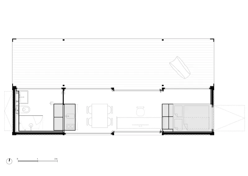 Floor plan drawing showing rectangular volume with central living space and end service cores
