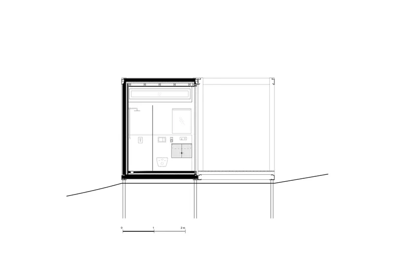 Section drawing showing interior spaces with clerestory glazing and deck projecting over sloped ground