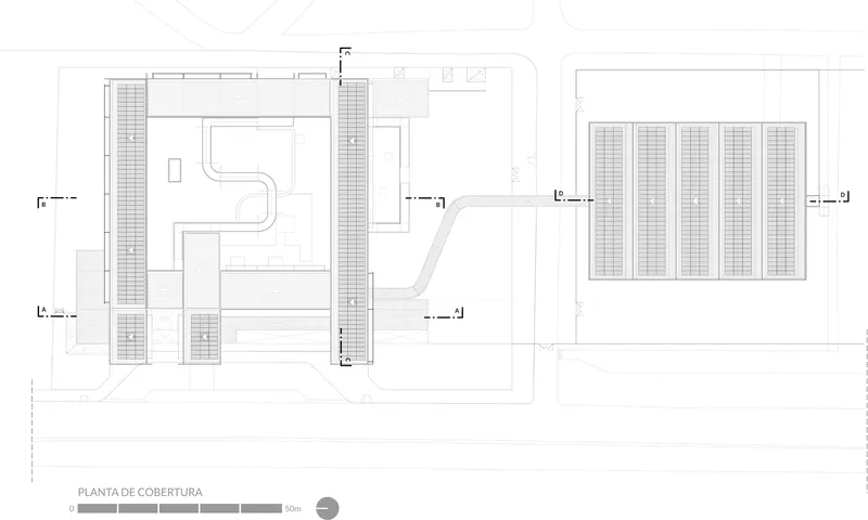 Roof plan drawing indicating seating areas and rectangular volumes arranged around courtyard spaces