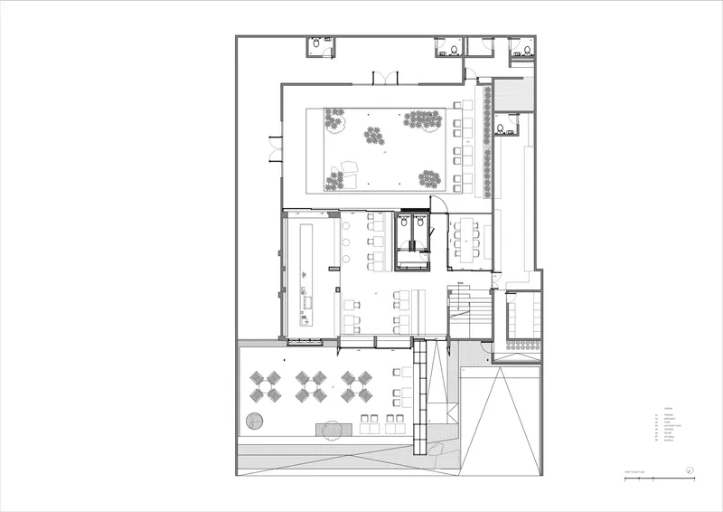 Ground floor plan showing a courtyard with trees, dining areas with table groupings and adjacent service spaces