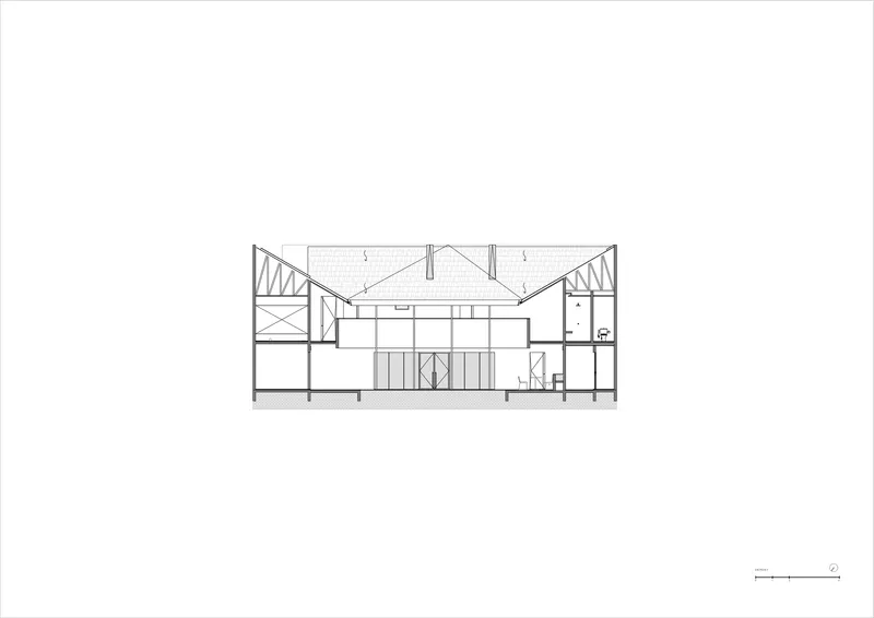 Section drawing showing a symmetrical pitched roof structure with central atrium and flanking spaces