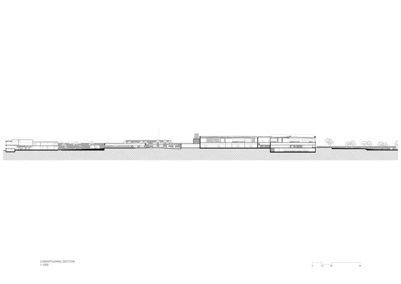 Longitudinal section drawing showing the low horizontal massing with varying roof heights and trees