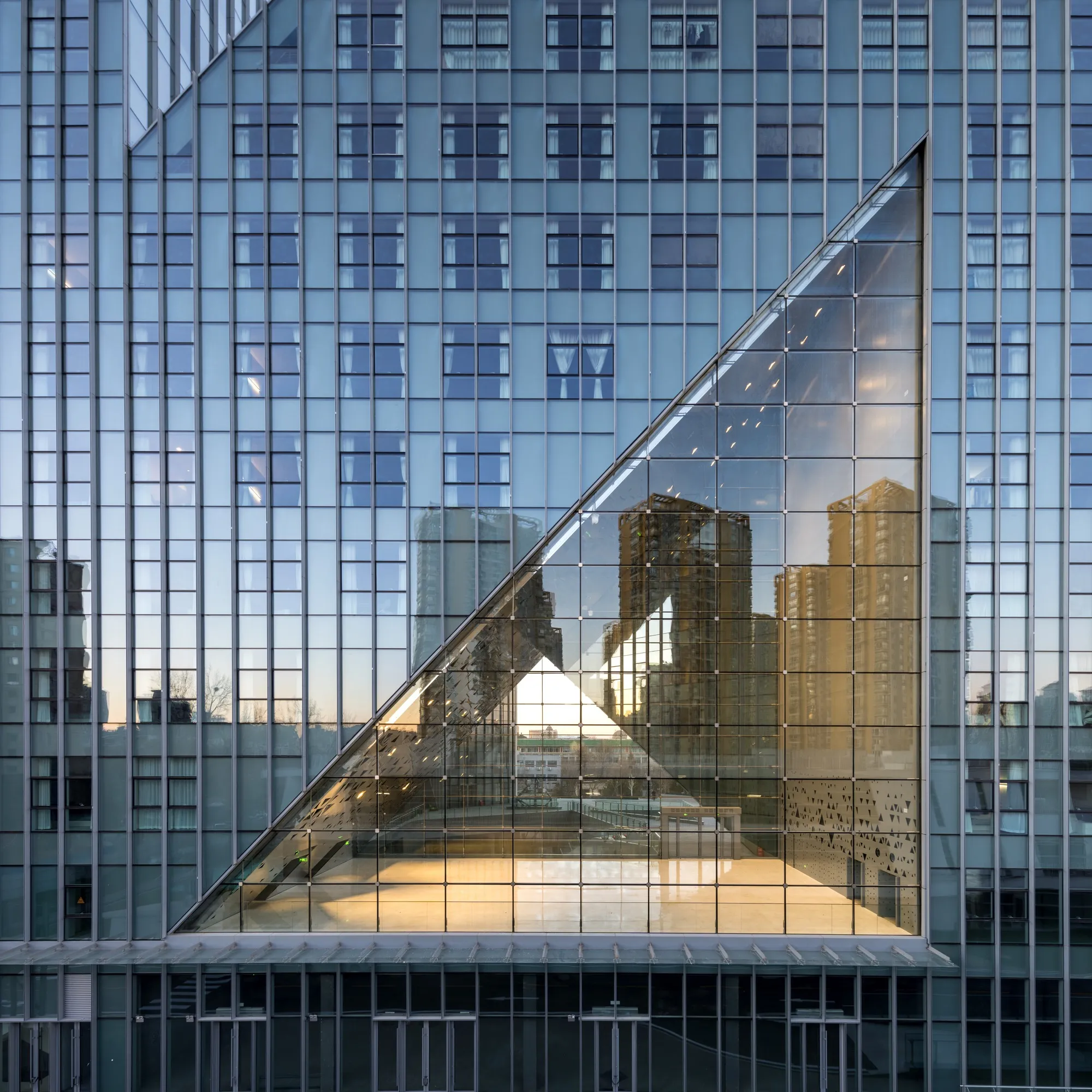 Zhu Xiaodi Architects and BIAD Carve Triangular Voids into a Beijing Talent Community