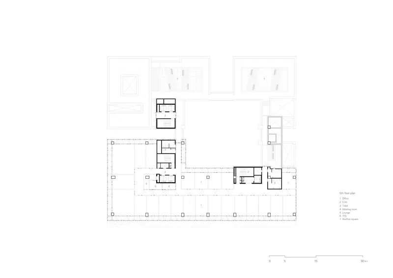 Floor plan drawing showing residential units along one edge with adjacent building outlines