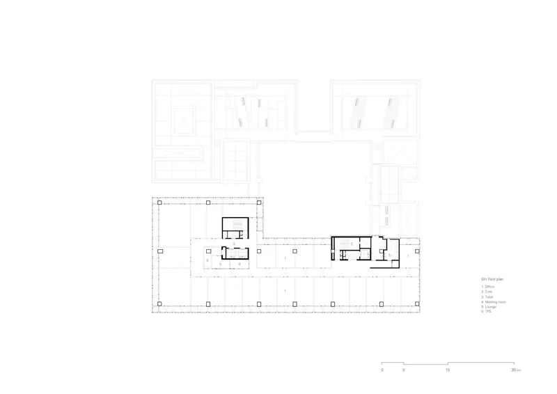 Floor plan drawing showing three residential units in a row with surrounding context outlined