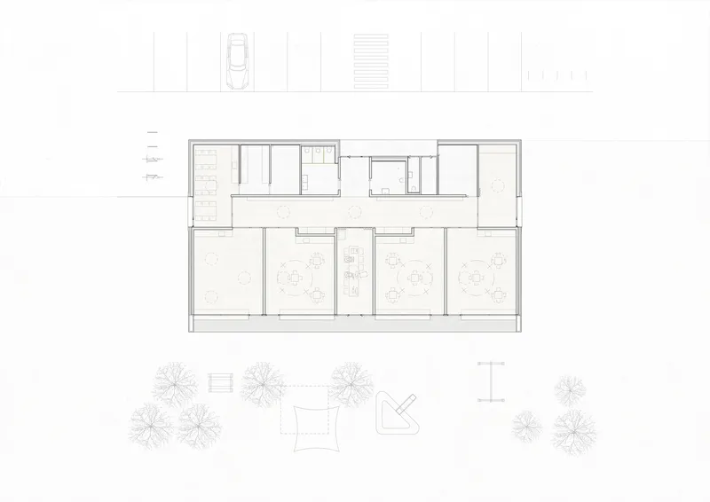 Floor plan drawing showing classroom layout with three large rooms and central service core
