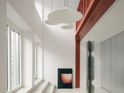Three Studios Revive a Paris Printing House as a Red-Framed Workplace in the Sentier