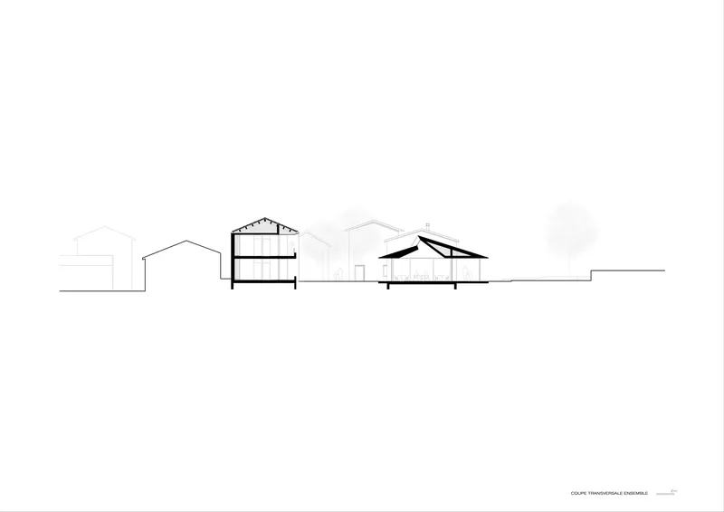 Section drawing showing varying roof profiles and floor levels across multiple connected structures