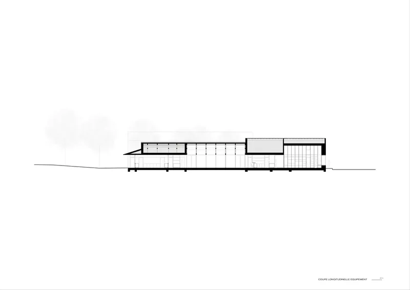 Section drawing showing a long low-slung building with exposed roof structure and column grid