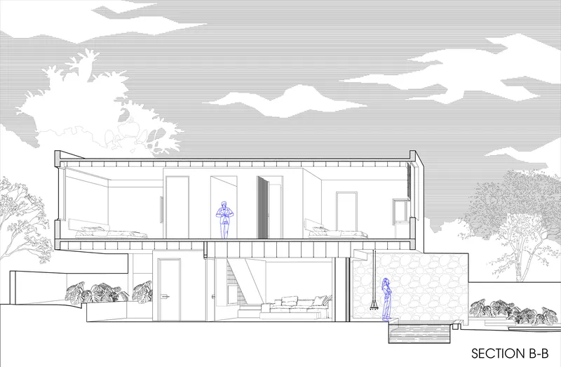 Section drawing showing double-height interior volume with upper balcony and planted surroundings