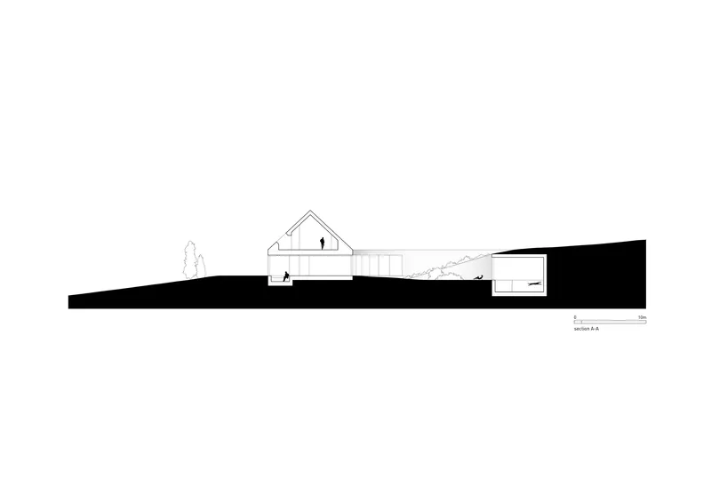 Section drawing showing a pitched roof volume and lower level carved into sloping terrain