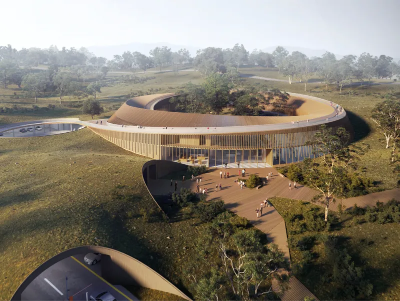 Circular timber sanctuary designed to immerse visitors within a protected koala rehabilitation landscape.