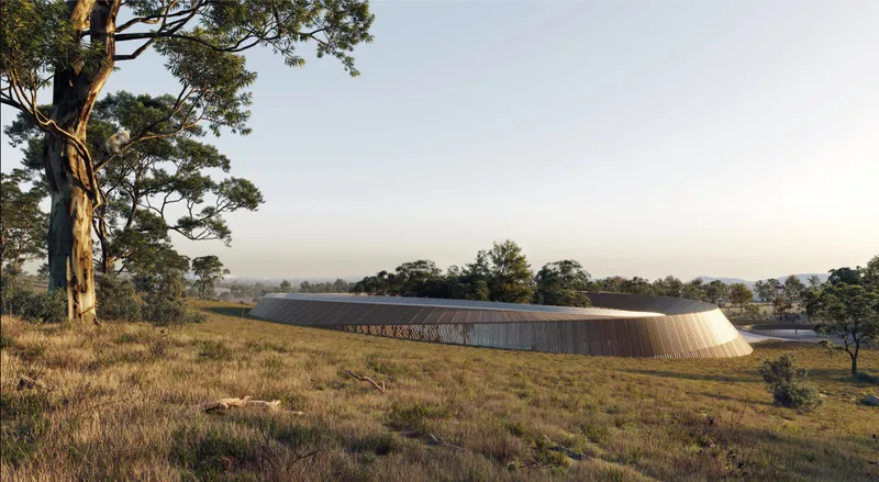 The low-profile architecture blends into the Australian terrain through sustainable landscape integration.