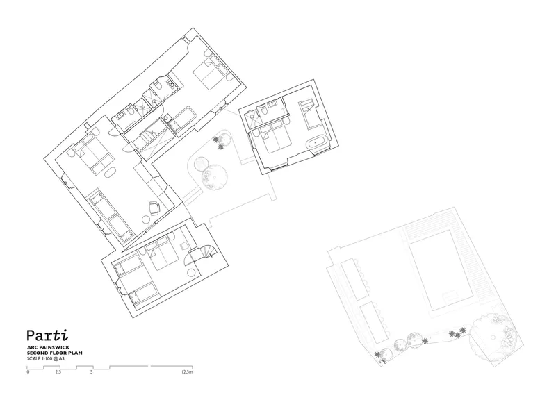 Second floor plan drawing showing angled rooms around a central courtyard with outbuilding