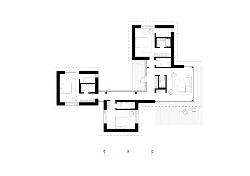 Floor plan drawing depicting four bedroom volumes connected by a central glazed corridor