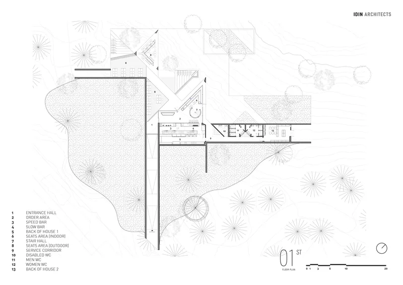 Floor plan drawing showing elongated bar layout with surrounding landscape and tree canopies