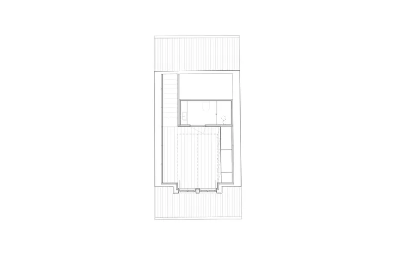 Floor plan drawing showing a rectangular volume with central courtyard and surrounding deck