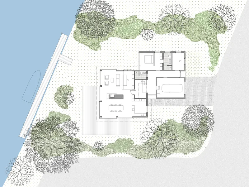 Site plan drawing showing the residence surrounded by landscaping and adjacent to a body of water