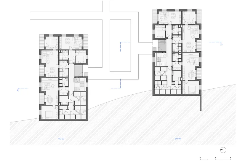 Floor plan drawing showing two multi-unit residential buildings with room layouts and circulation cores