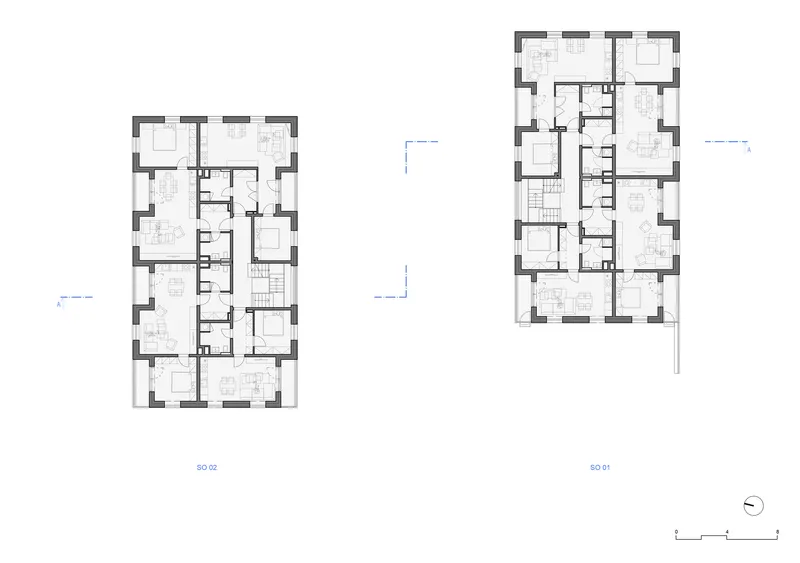 Floor plan drawing showing two residential buildings with rectangular layouts and central stairwells