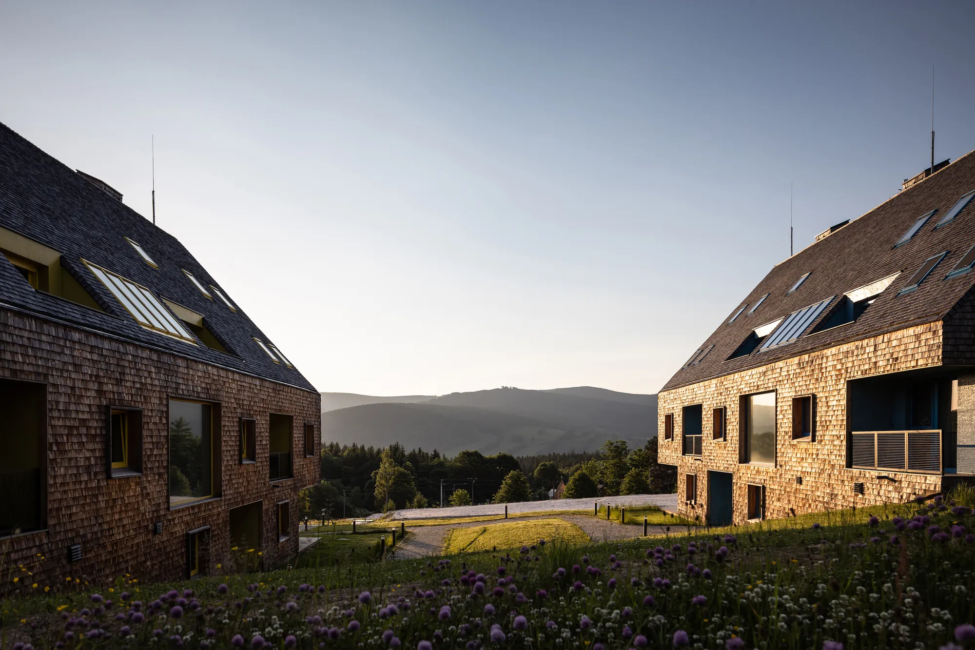 CL3 Studio Wraps Two Apartment Buildings in Larch Shingles in the Czech Highlands