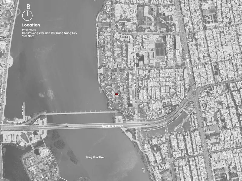Site plan showing the residential plot location adjacent to a river and bridge infrastructure