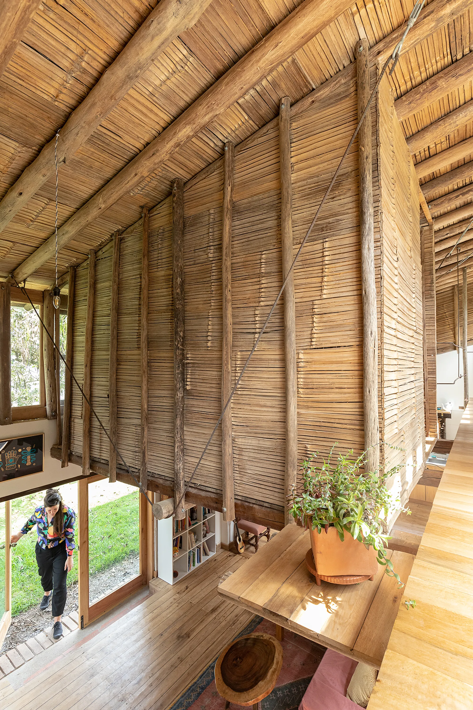 La Cabina de la Curiosidad Suspends Two Bedroom Nests from the Ceiling of a Converted Warehouse in Ecuador