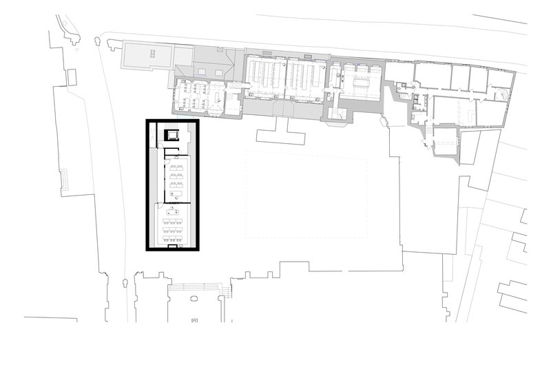 Floor plan drawing depicting the chapel as a narrow rectangle with surrounding site context and trees