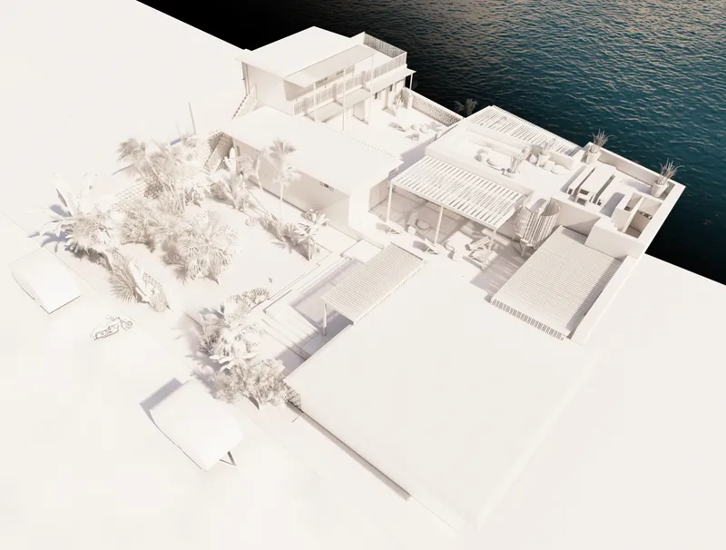 Physical model showing terraced volumes with courtyards and plantings descending toward a water edge