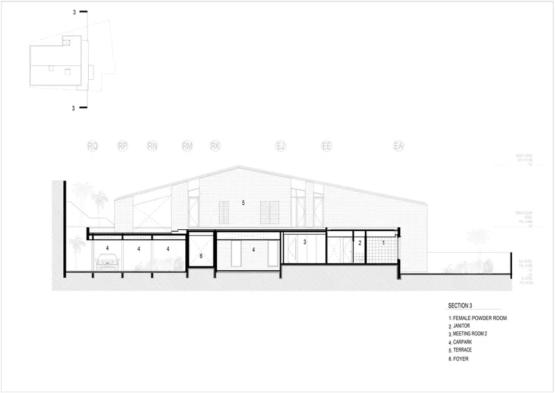 Section drawing showing the interior volumes including meeting rooms, foyer, and terrace under a pitched roof
