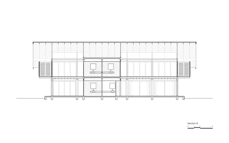 Section drawing showing two-story interior arrangement with central stair and symmetrical room layout