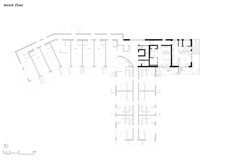 Second floor plan illustrating repeating residential modules with private balconies indicated by dotted plantings